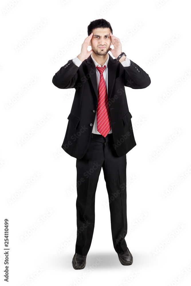 Male manager having headache in the studio Male manager having headache in the studio