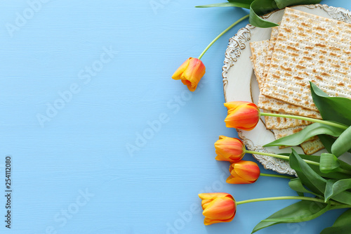 Pesah celebration concept (jewish Passover holiday) over green background. top view flat lay