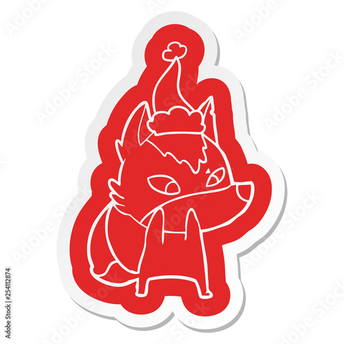 shy cartoon  sticker of a wolf wearing santa hat