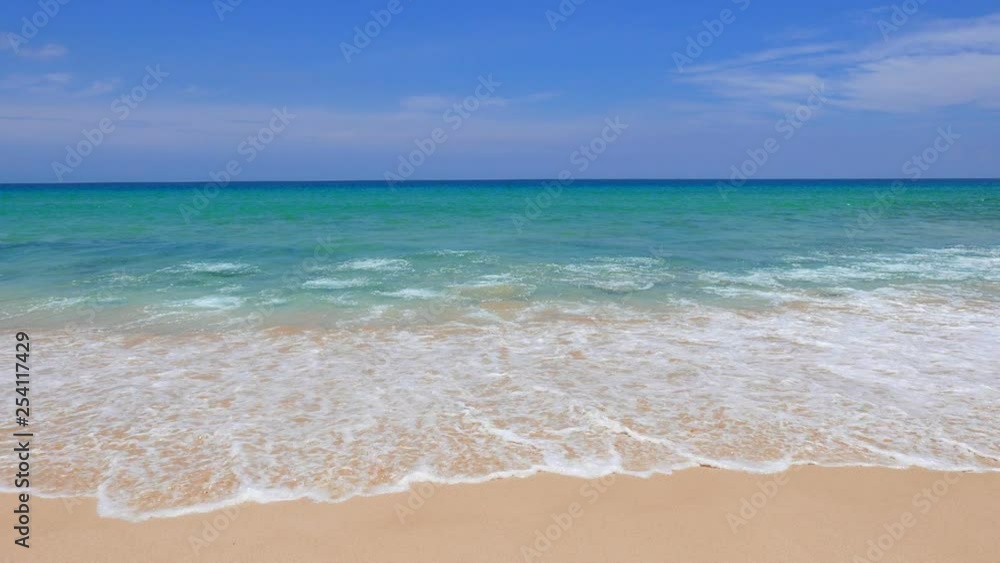 Beautiful waves of the turquoise ocean at a peaceful empty beach. Beautiful waves of the turquoise ocean at a peaceful empty beach.