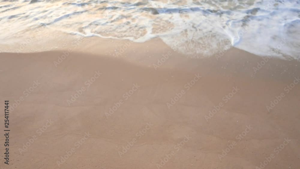 Medium shot of calm and peaceful waves at the beach. Medium shot of calm and peaceful waves at the beach.