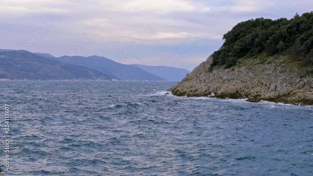 Beautiful coast scene of Brestova on a cloudy day. Croatia. Flat plane. Slow motion Beautiful coast scene of Brestova on a cloudy day. Croatia. Flat plane. Slow motion