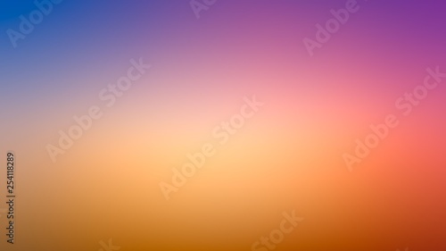 Abstract blur gradient purple and orange colors background