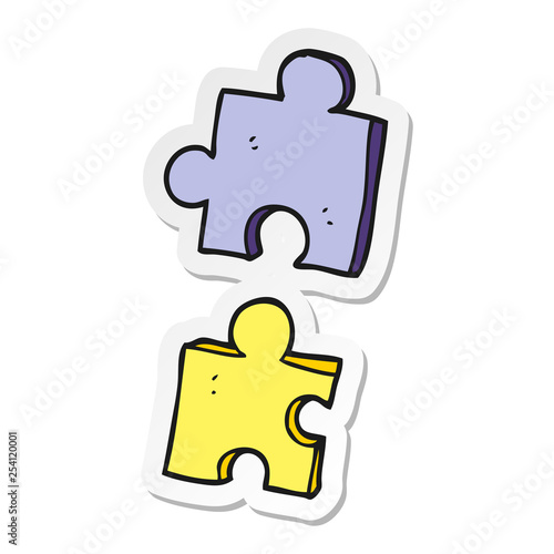 sticker of a cartoon jig saw pieces