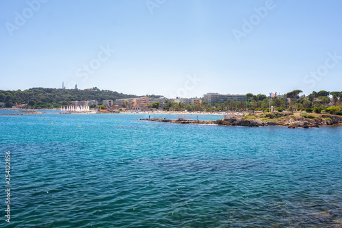 View of the beach Du Ponteil of the town Antibes.