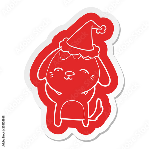 happy cartoon  sticker of a dog wearing santa hat
