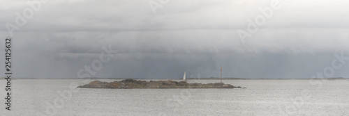 Slika na platnu Finnish archipelago on cloudy day.