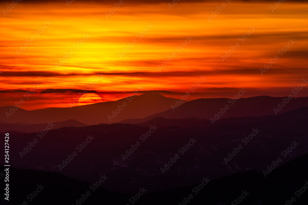 Beautiful sunset over mountains layers in Umbria (Italy) Beautiful sunset over mountains layers in Umbria (Italy)