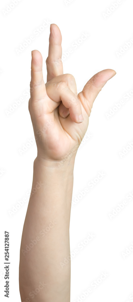 Female hand shows gesture Female hand shows gesture