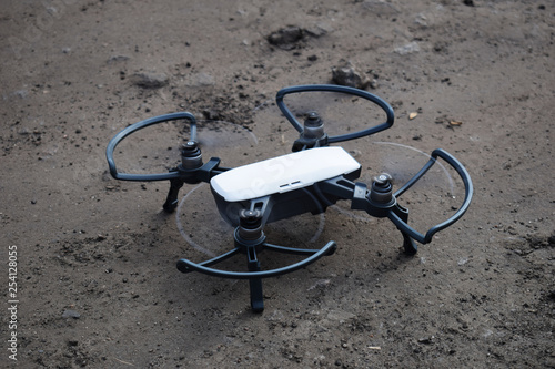 The drone landed on the ground, new technologies, new entertainment for humans
