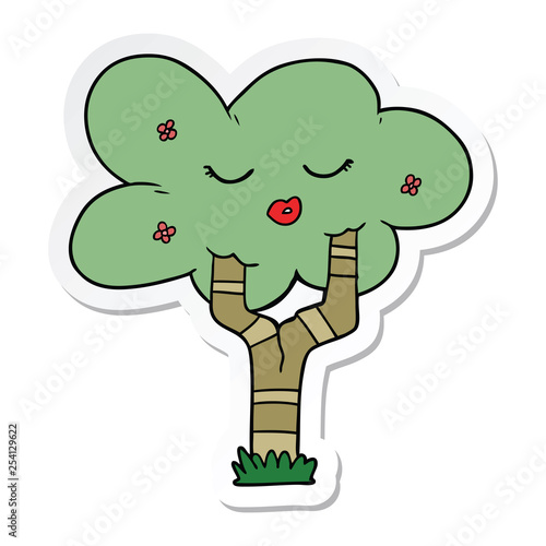 sticker of a cartoon tree with face