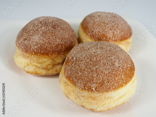 fresh baked german carnival donuts with sugar
