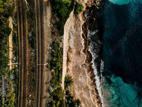 Aerial view of the railway along the sea coast in Italy