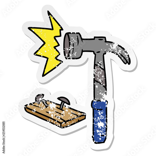 distressed sticker cartoon doodle of a hammer and nails