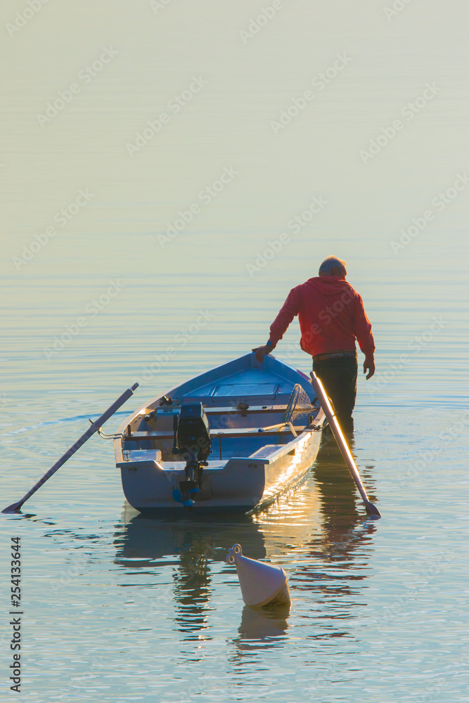 Boatman prepares to launch his fishing boat