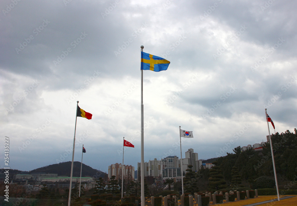 Swediah Flag Waving in the air of UN Memorial Cemetery in Busan, South Korea, Asia