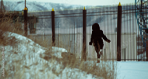Woman running in winter photo