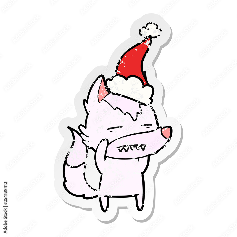 distressed sticker cartoon of a wolf showing teeth wearing santa hat distressed sticker cartoon of a wolf showing teeth wearing santa hat