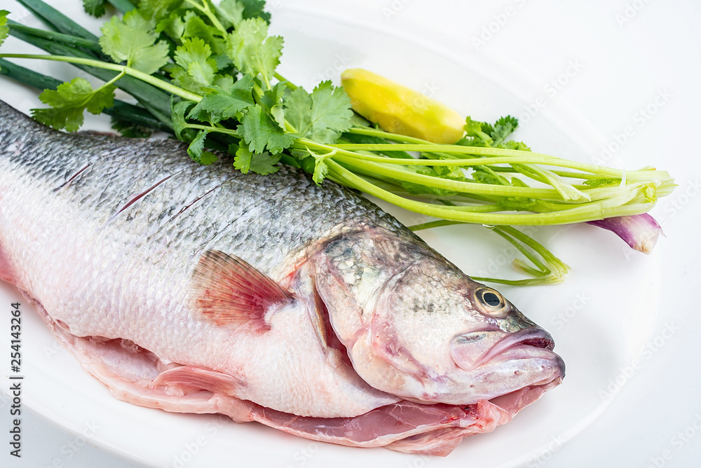 Cleaning chopped fresh salmon and ingredients Cleaning chopped fresh salmon and ingredients