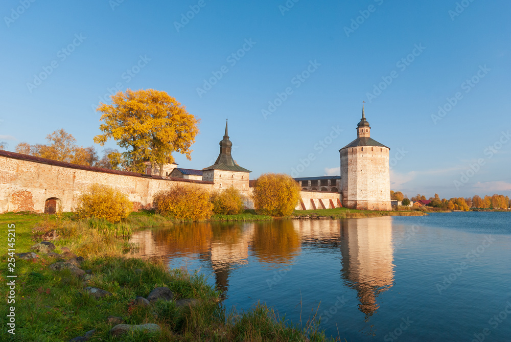 Magnificent landscape with a view of the lake in autumn and the monastery