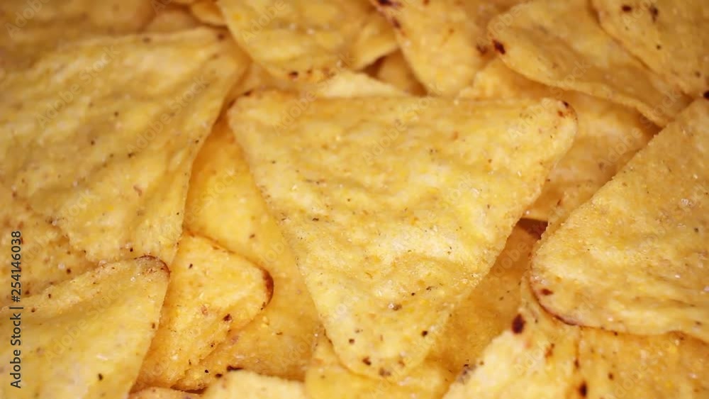 tortilla corn chips closeup texture video on rolling rotating looping plate tortilla corn chips closeup texture video on rolling rotating looping plate