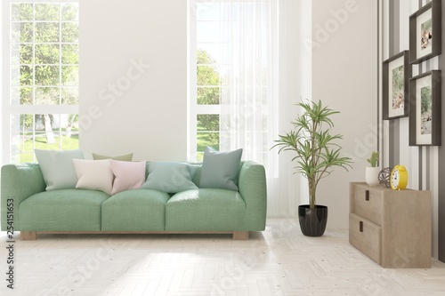 White stylish minimalist room with sofa and summer landscape in window. Scandinavian interior design. 3D illustration