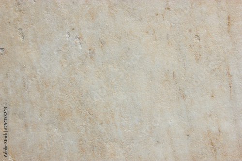Antique old Greek Roman granite stone beige color texture background © margo1778
