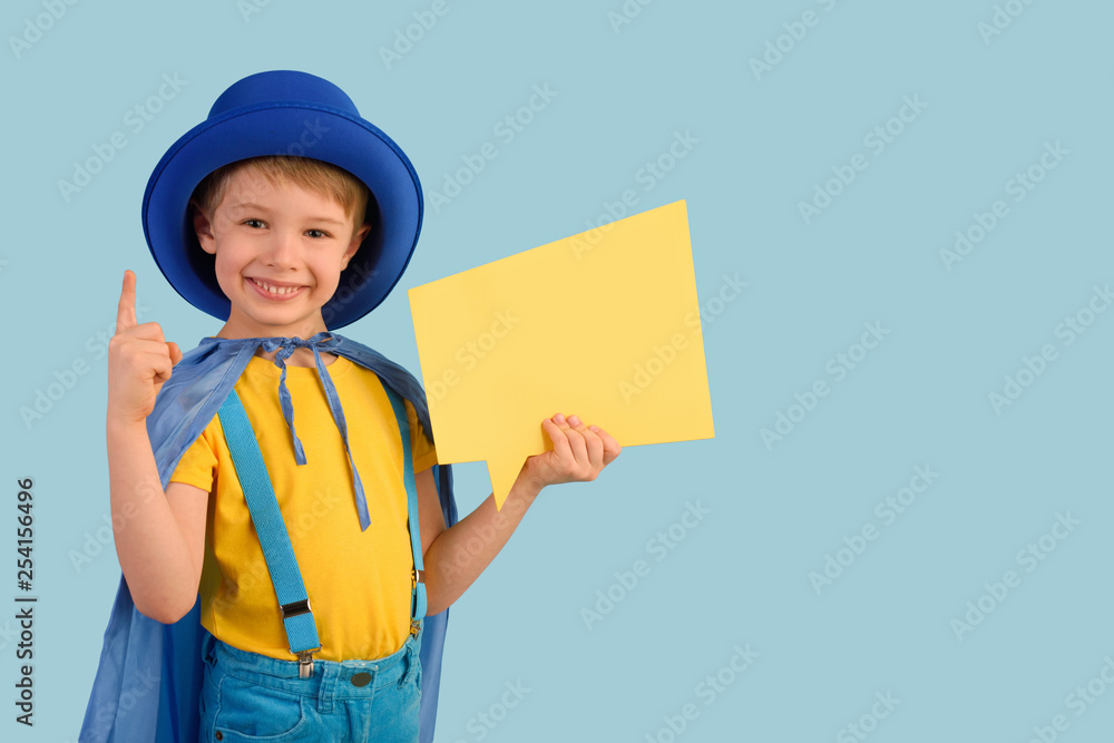 Little boy is holding an important message. Gesture of attention. Positive message on yellow board. Little boy is holding an important message. Gesture of attention. Positive message on yellow board.
