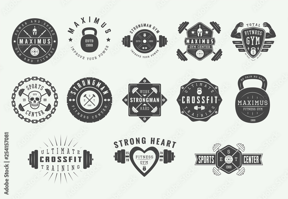 Fototapeta Set of vintage gym fitness logos, emblems, badges, labels, marks and design elements. Retro graphic art. Vector Illustration.