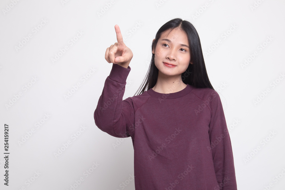 Asian woman touching the screen with finger. Asian woman touching the screen with finger.