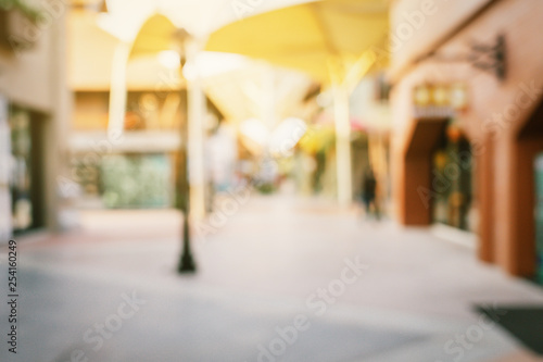 Vintage tone blurred defocused day of crowd people in walking street festival and shopping mall.