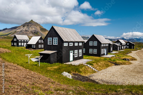 Wooden houses in Icelandic Hellnar village. photo