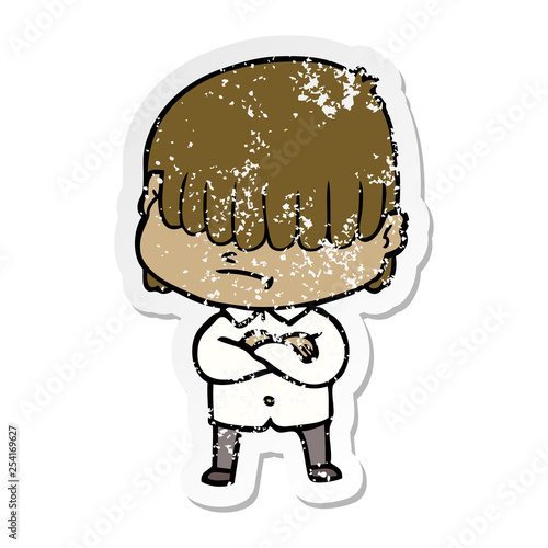 distressed sticker of a cartoon boy with untidy hair