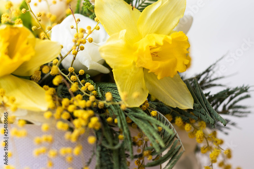 Fototapeta Naklejka Na Ścianę i Meble -  Colorful spring flowers bouquet. Narcissus, mimose