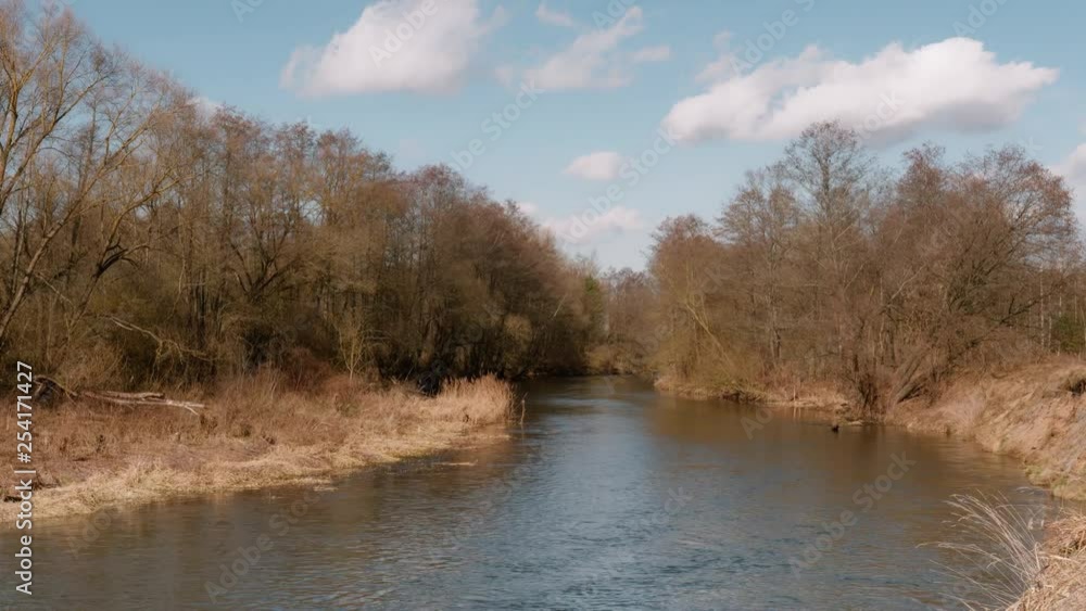 the beginning of spring. wild fast river among the thickets the beginning of spring. wild fast river among the thickets