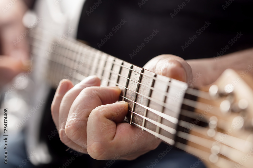 man playing guitar
