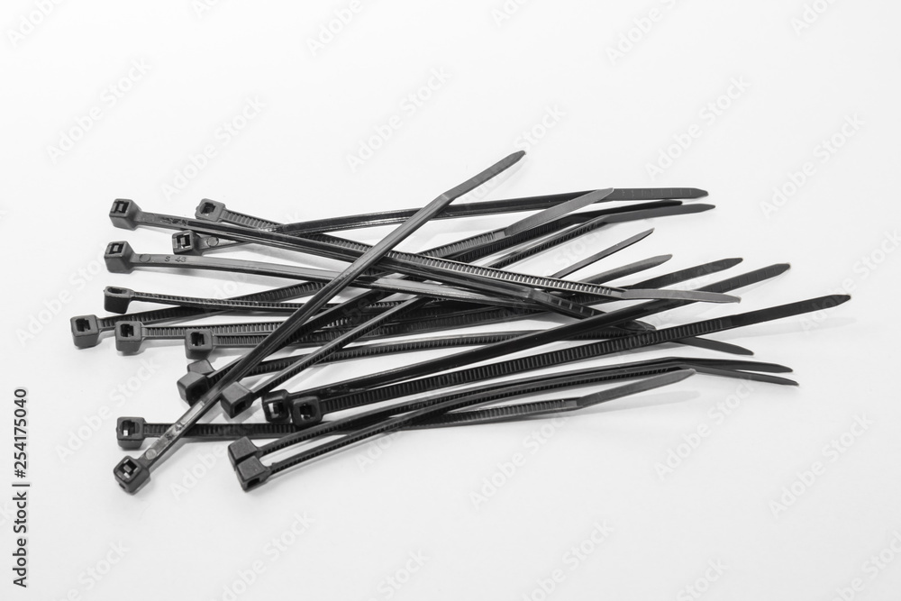 The bunch of black nylon ties. Plastic screeds. The bunch of black nylon ties. Plastic screeds.