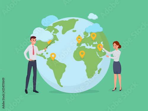 Man and woman standing near globe