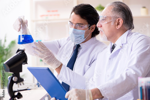 Two chemists working in the lab 