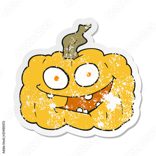 retro distressed sticker of a cartoon pumpkin photo