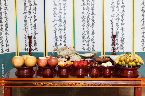 Картината върху платно Table setting with various fruits and foods for Korean traditional Holiday