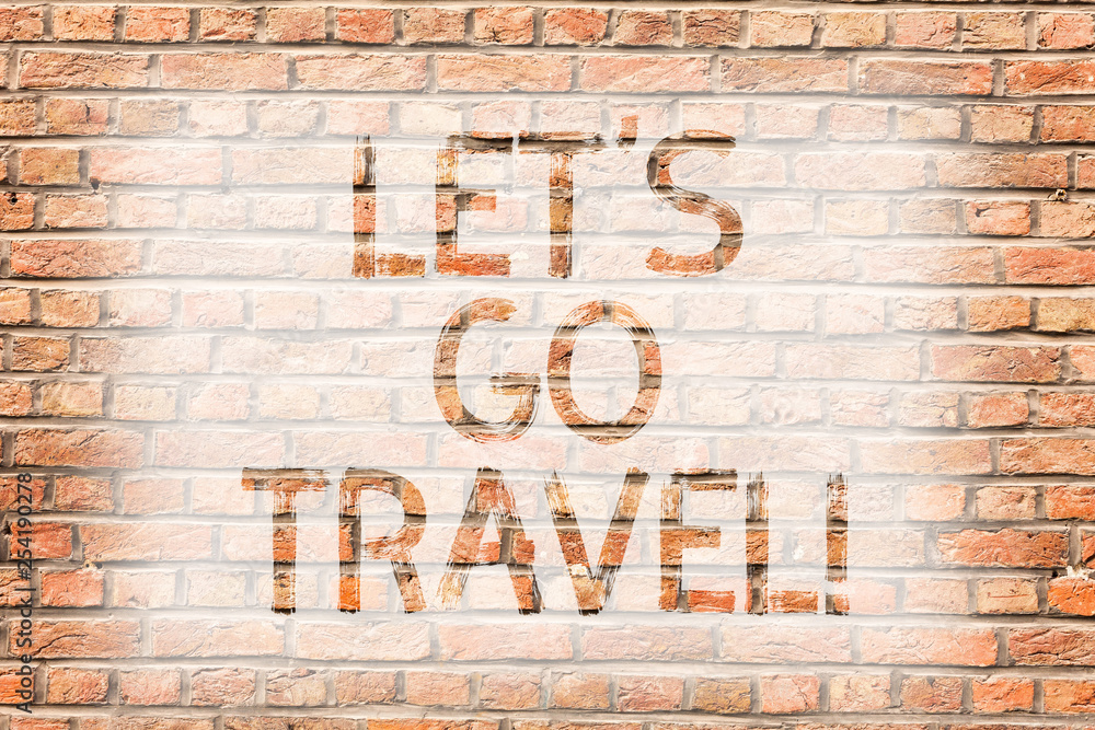 Text sign showing Let S Go Travel. Business photo text Going away Travelling Asking someone to go outside Trip Brick Wall art like Graffiti motivational call written on the wall Text sign showing Let S Go Travel. Business photo text Going away Travelling Asking someone to go outside Trip Brick Wall art like Graffiti motivational call written on the wall