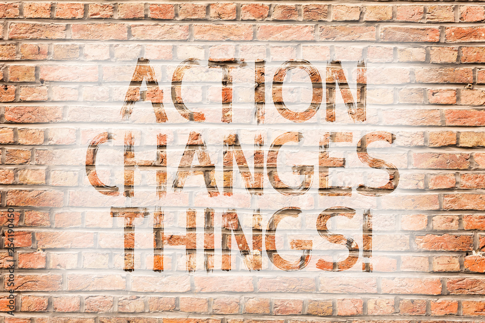 Text sign showing Action Changes Things. Business photo text improve yourself Do not stand still Let s is do it Brick Wall art like Graffiti motivational call written on the wall Text sign showing Action Changes Things. Business photo text improve yourself Do not stand still Let s is do it Brick Wall art like Graffiti motivational call written on the wall