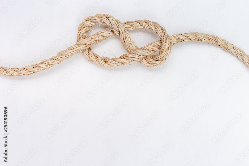 Figure-eight knot or Savoy knot on white background. Copy space. Figure-eight knot or Savoy knot on white background. Copy space.