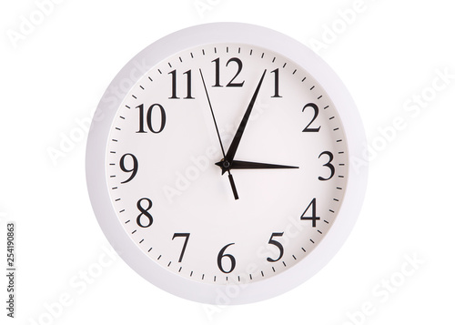 Wall clock with a round white dial.