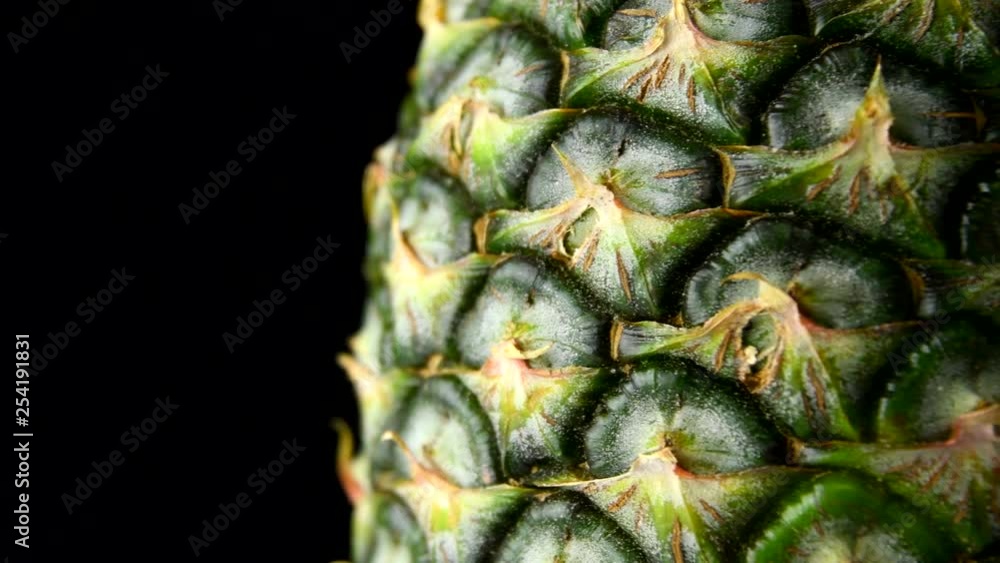Pineapple spinning on black background, 4K Pineapple spinning on black background, 4K