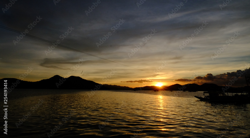 Orange sunset landscape of Coron Island