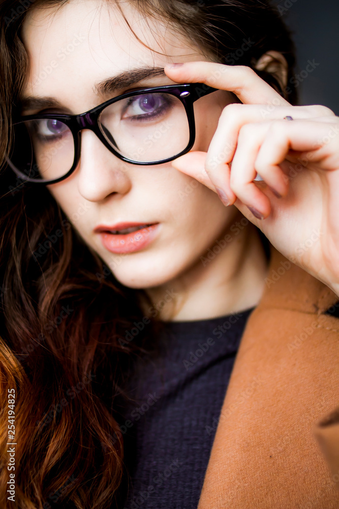 Fototapeta premium Beautiful Russian girl in glasses with diopters