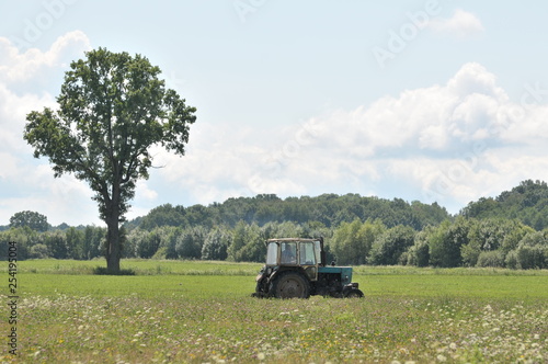 old tractor in the field © polakravis