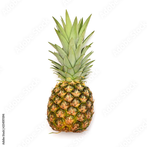 Pineapple whole isolated on white background. Creative tropical fruit concept. Flat lay, top view